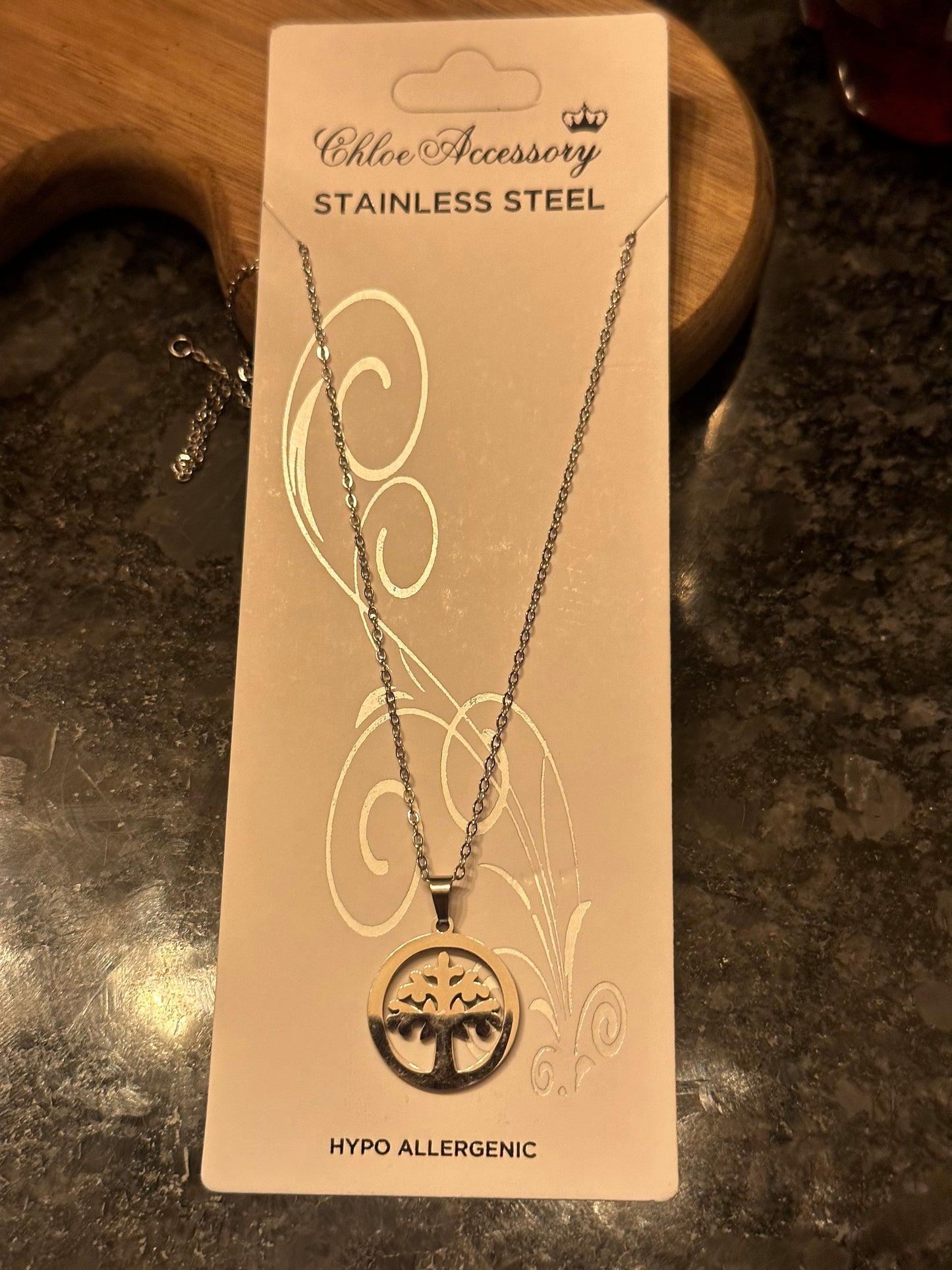 Stainless steel, hypo allergenic tree of life necklace.